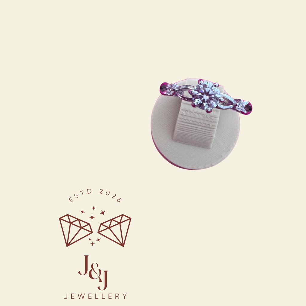 Elegant twisted crossover solitaire setting