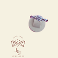 Elegant twisted crossover solitaire setting